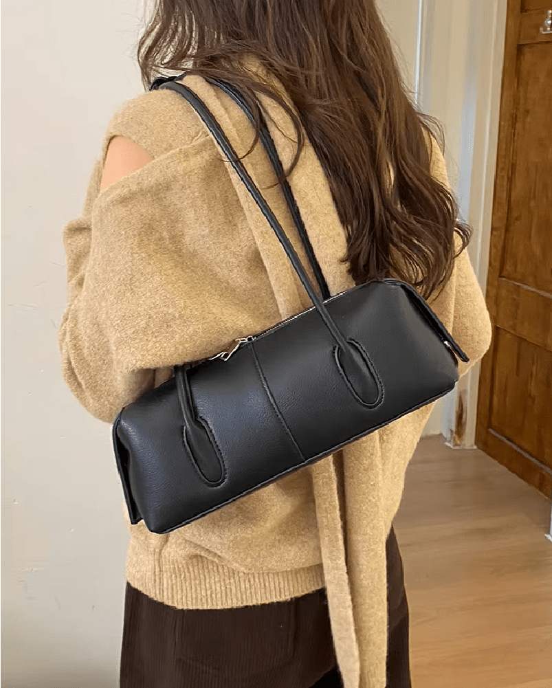 Hannah Zylindrische Schultertasche aus Leder