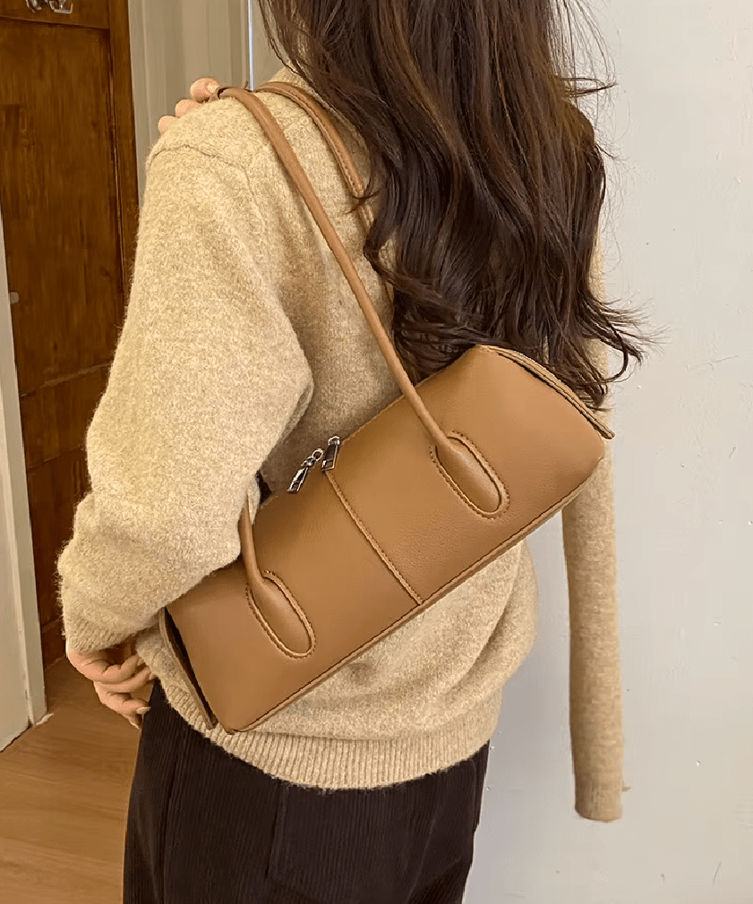 Hannah Zylindrische Schultertasche aus Leder