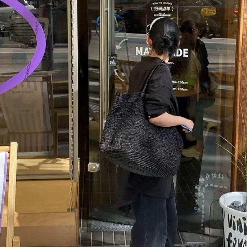 Vivienne käsin kudottu rottinkikassi