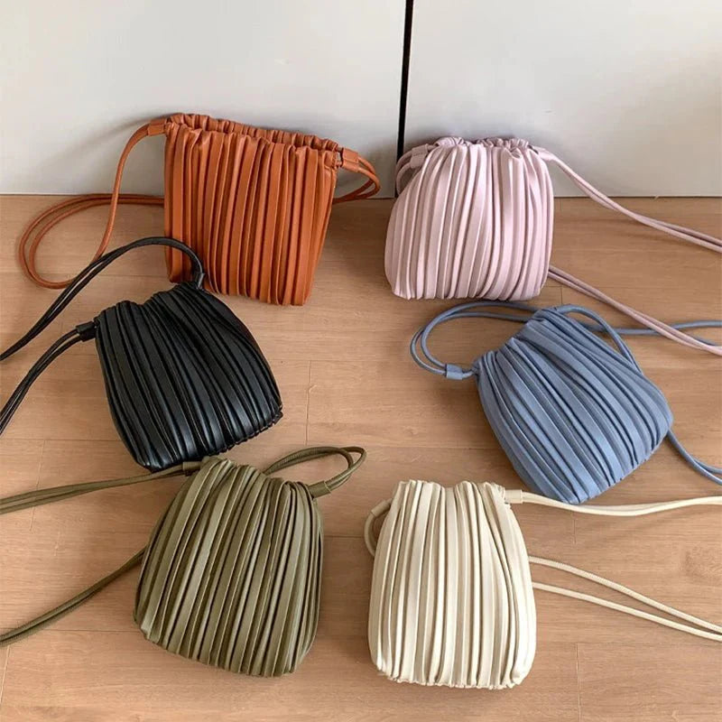 Sadie klostuota mini rankinė per kūną