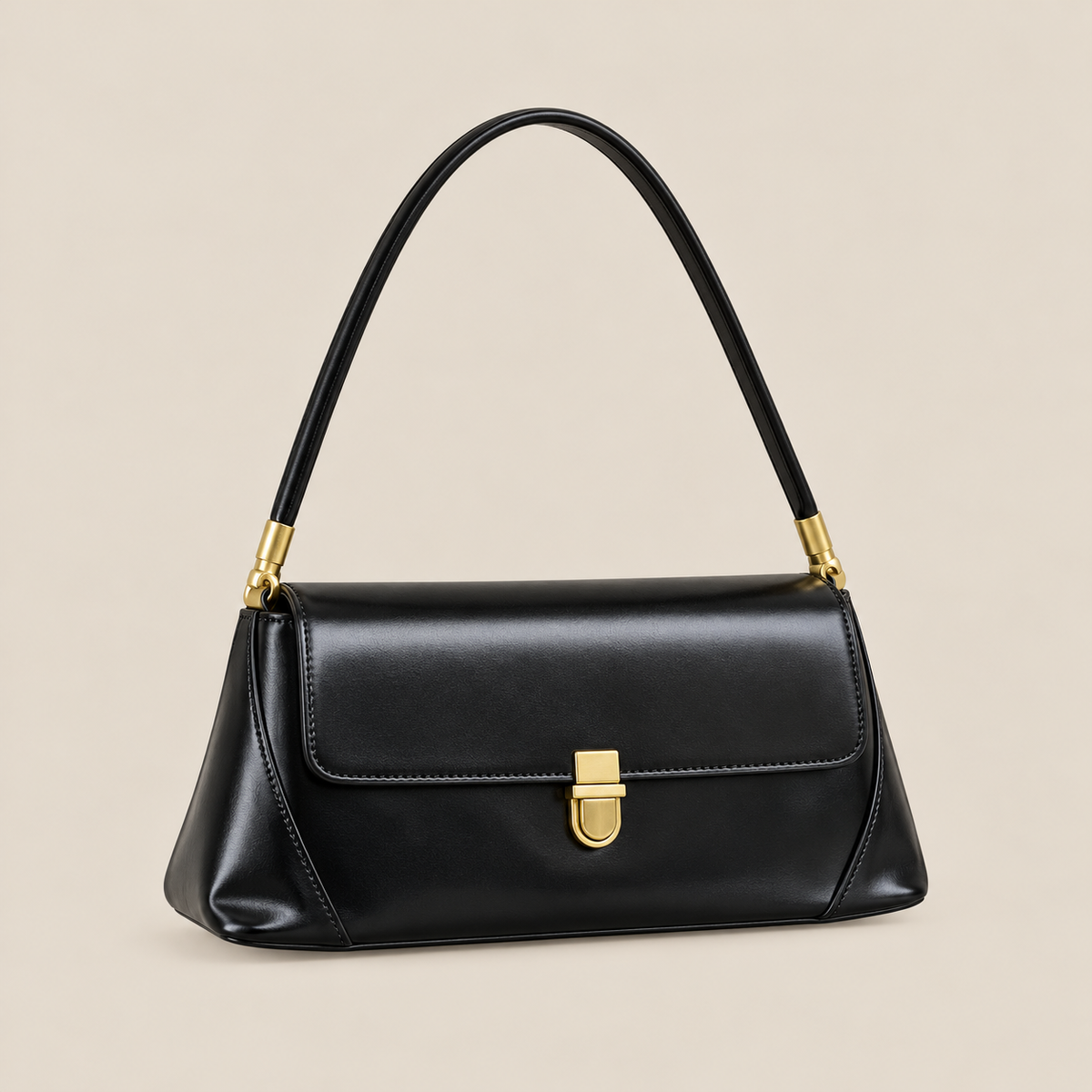 Tilda black shoulder handbag with gold clasp on beige
