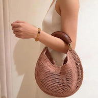 Geneva Crescent geflochtene Kunstledertasche