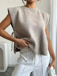 Laura dzianinowy sweter z kokardkami