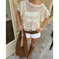 Blouse courte Maia en mousseline transparente avec dentelle