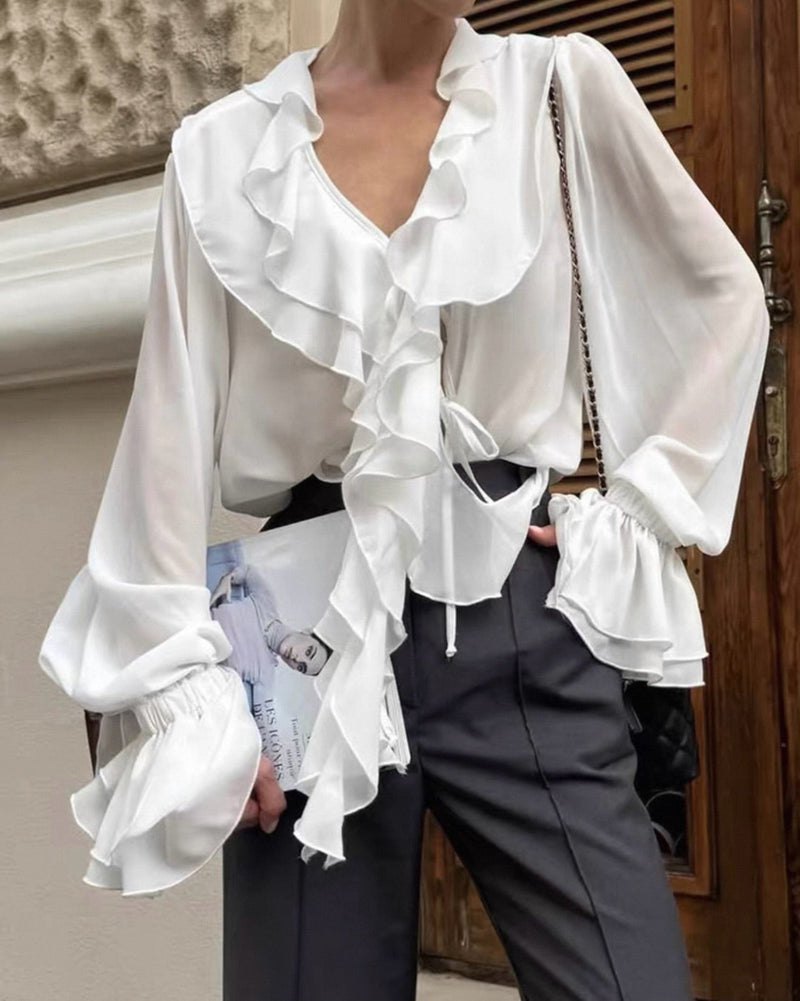Monica Striknek Roeselblouse
